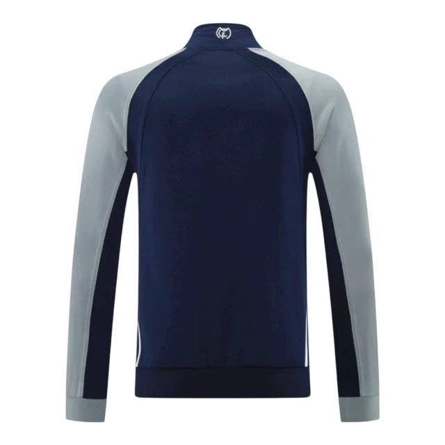 Chaqueta Cortavientos Real Madrid 25/26 (Azul/Gris)